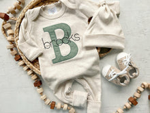 Load image into Gallery viewer, Personalized neutral baby romper and hat set, custom infant boy coming home outfit, baby shower gift, sleeper with footies green christmas