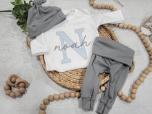 Load image into Gallery viewer, Personalized baby romper and hat set, custom infant boy coming home outfit baby shower gift, oatmeal sleeper with footies bodysuit