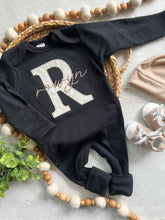 Load image into Gallery viewer, Personalized neutral baby romper and hat set, custom infant boy coming home outfit, baby shower gift, black sleeper with footies