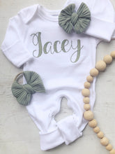 Load image into Gallery viewer, Personalized vintage stitch girl romper with bow, custom girl coming home outfit, baby shower gift, white sleeper with footies
